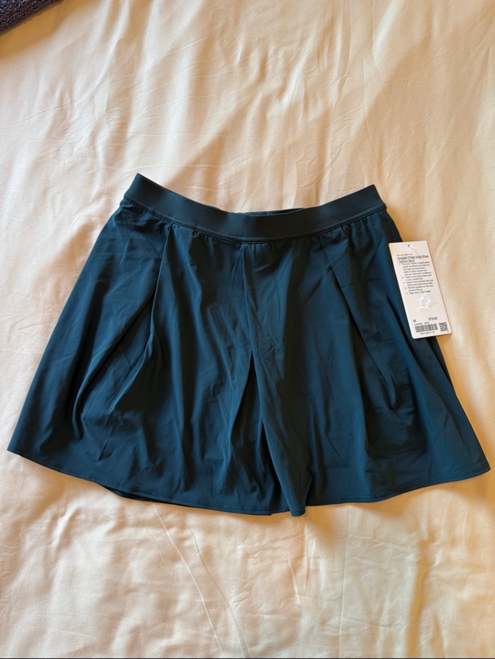 Rainforest green lululemon angled pleat high rise tennis skirt